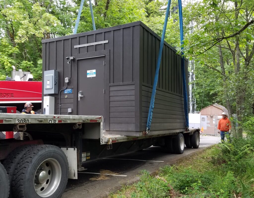 TKK LLC loading a power box onto a truck in Skagit County